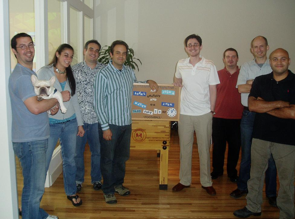 A group of people standing in a room
