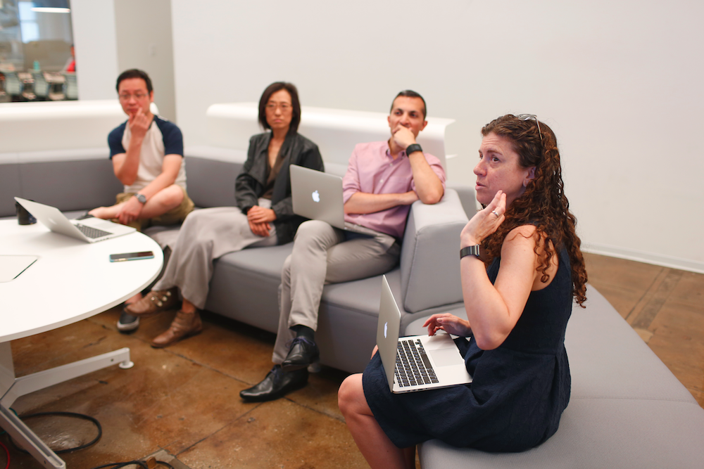 A group of people sitting at a table