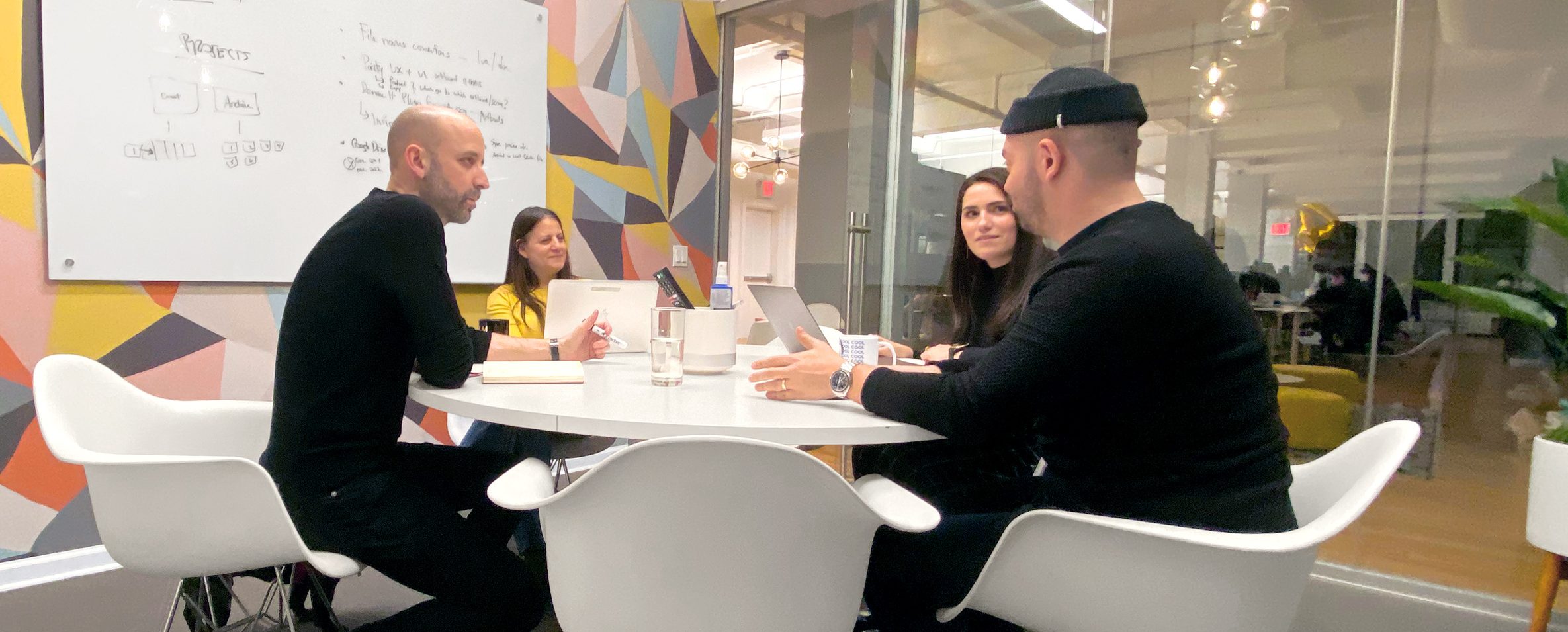 A group of people sitting at a table