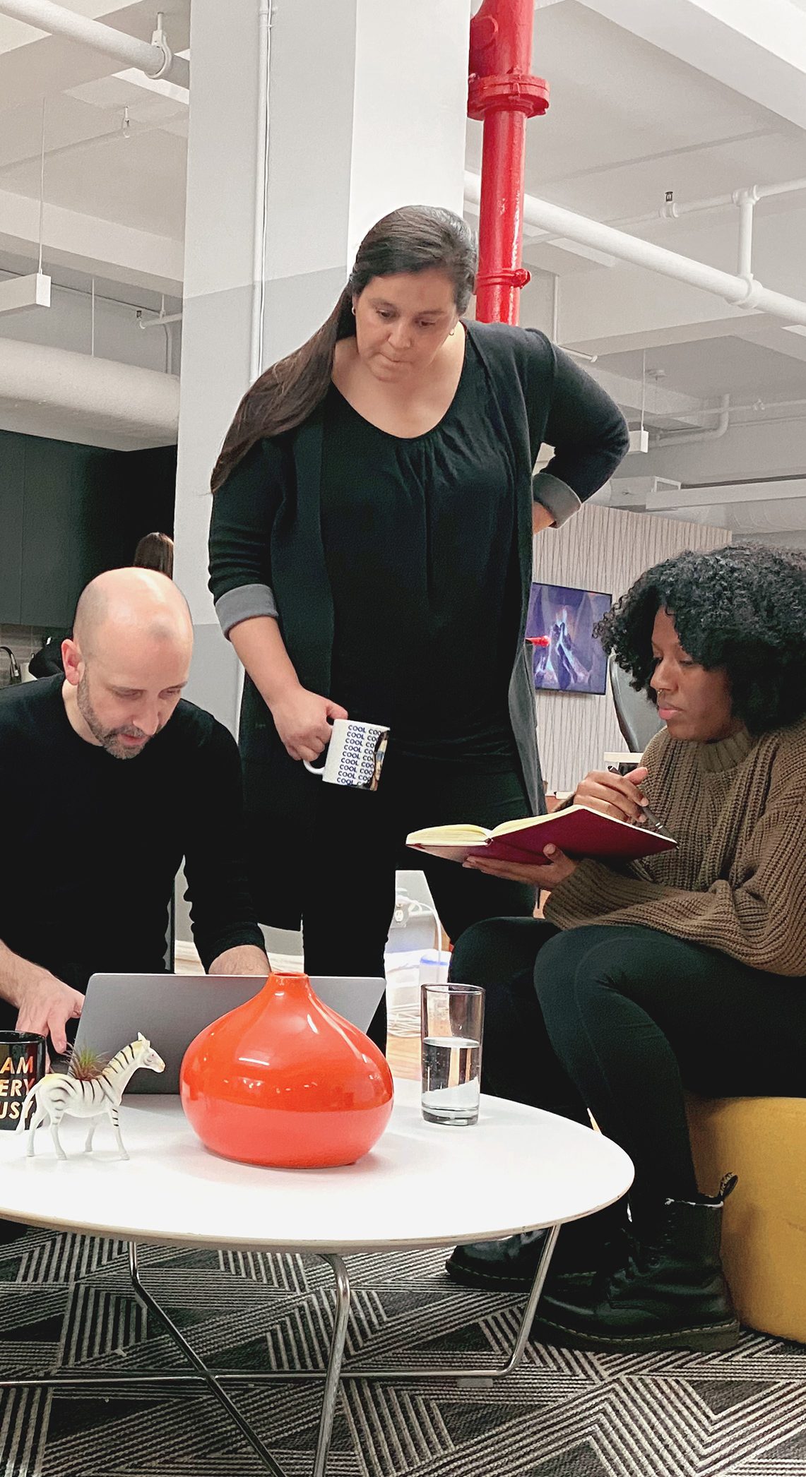 A group of people sitting at a table