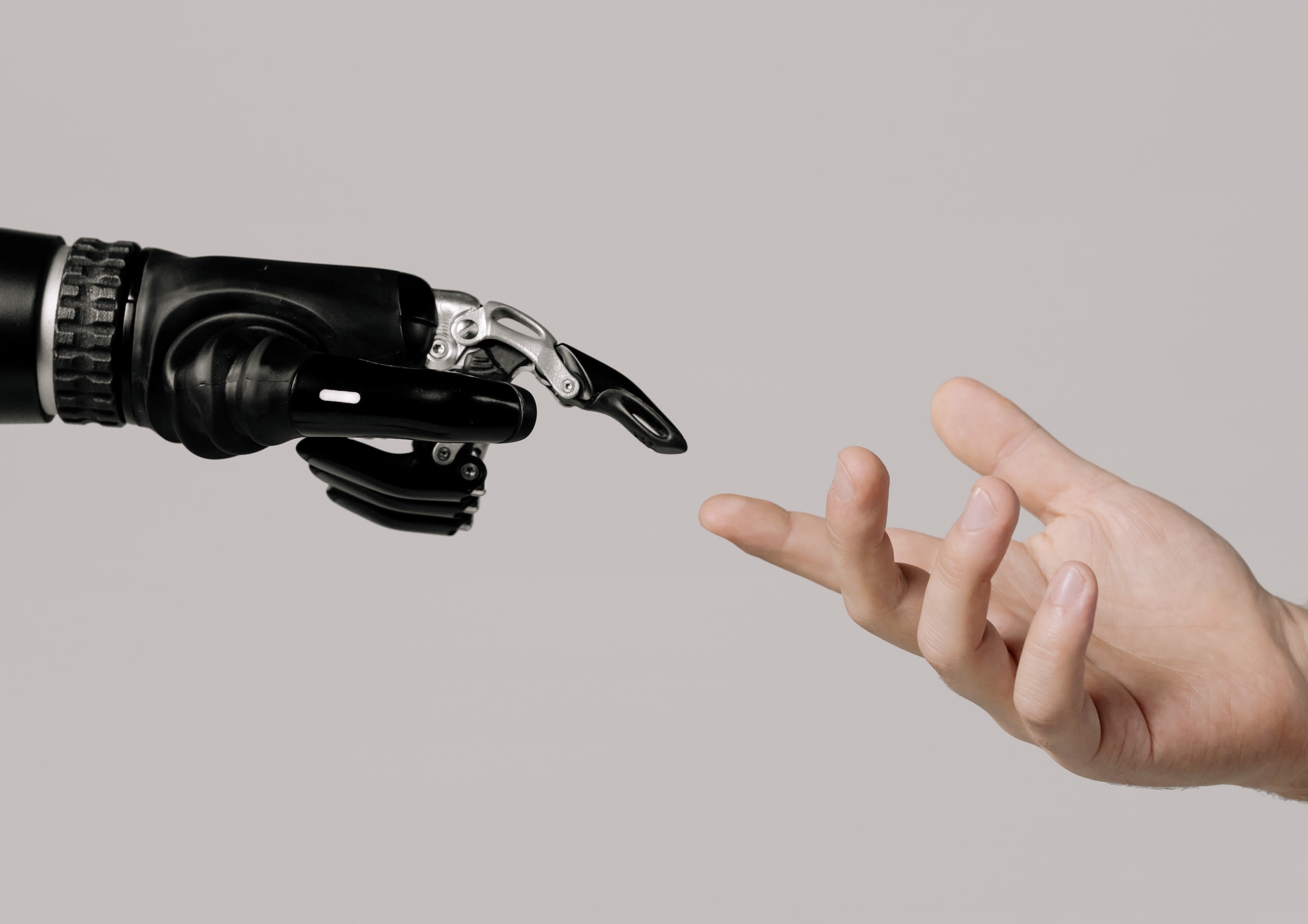 Robot hand touching human hand in the style of the creation of Adam